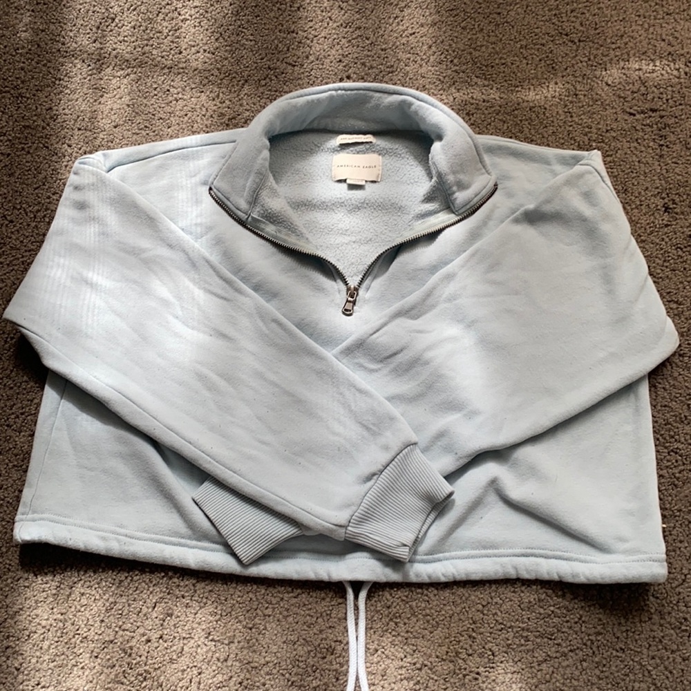 Light blue American eagle cropped hoodie.